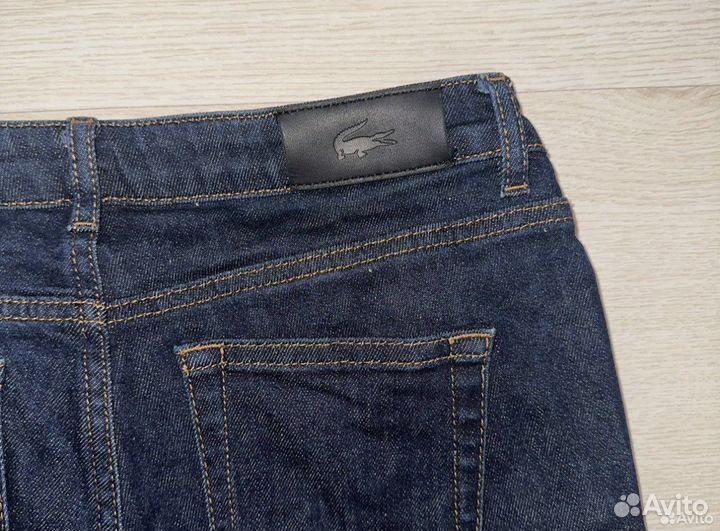 Джинсы Lacoste