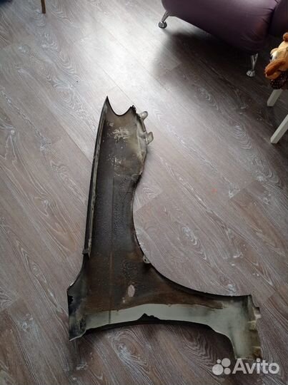 Крыло левое переднее Kia Spectra