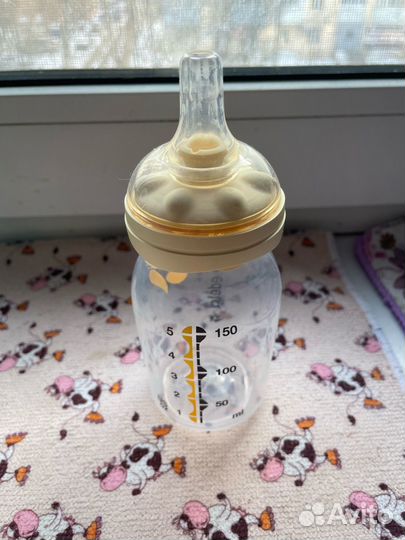 Бутылочка для кормления madela + пакеты для молока