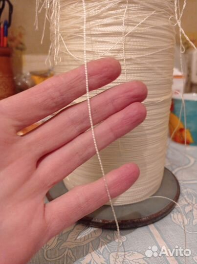 Тонкая веревка на бобине