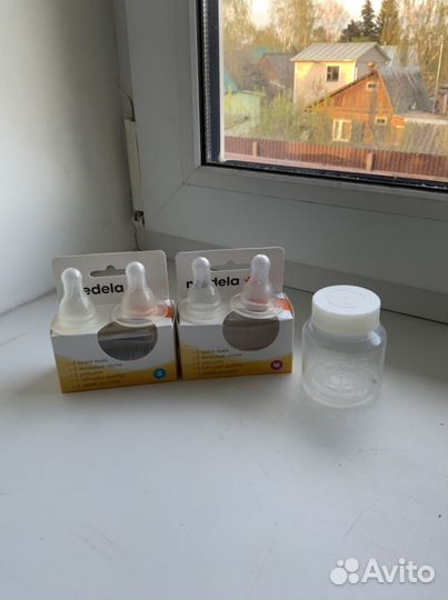 Молокоотсос ручной medela двухфазный+бутылочки+сос