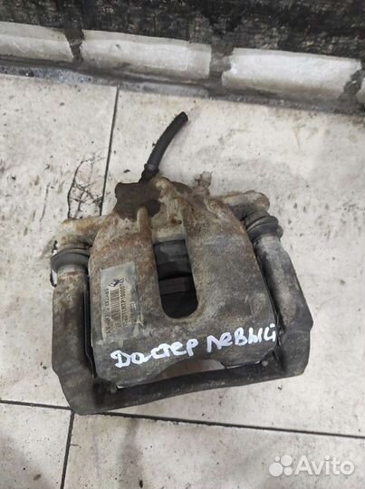 Суппорт передний левый Renault Duster