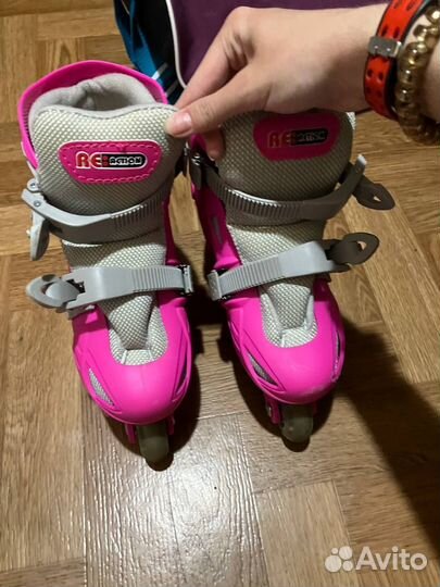 Роликовые коньки