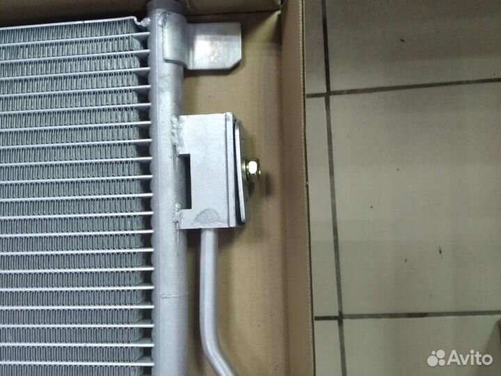 Радиатор кондиционера Шевроле Кобаль Авео