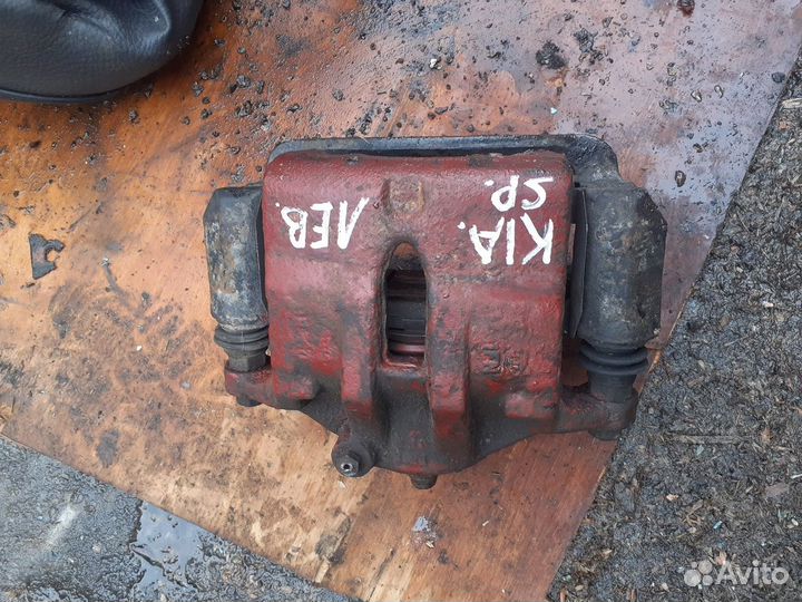 Передний левый суппорт на Kia Sportage 3