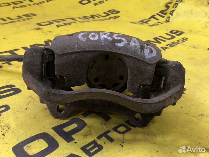 Передний правый суппорт Opel Corsa D