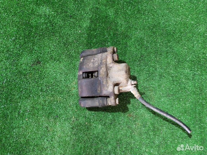 Тормозной суппорт передний левый Renault Logan