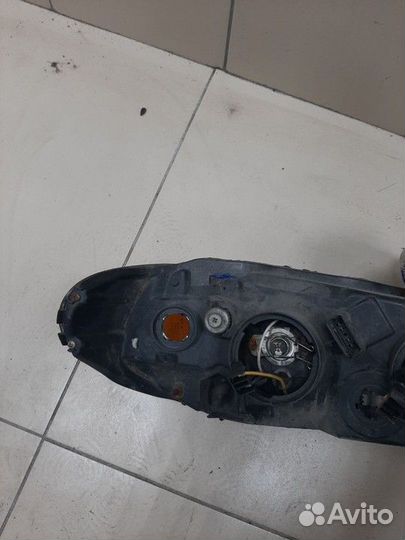 Фара левая Nissan Almera