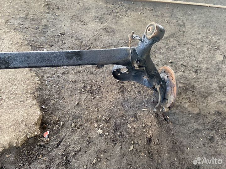 Задняя балка toyota corolla auris