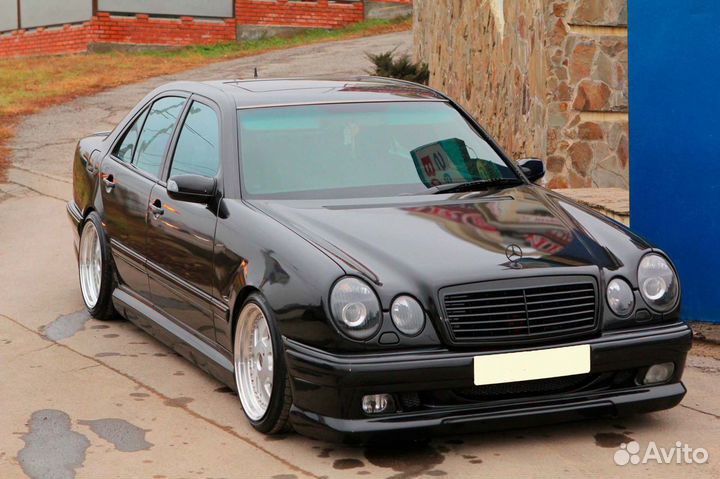 Стекло левой фары Mercedes E-Class w210 1995-1999