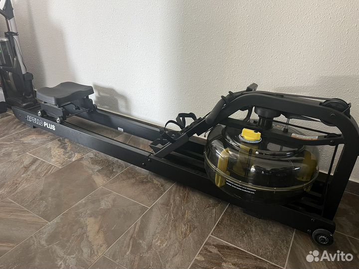 Гребной тренажер