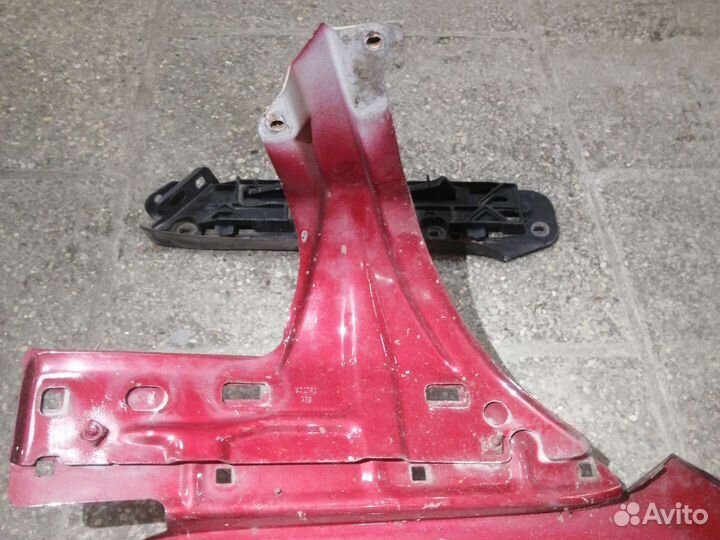 Кронштейн левого крыла Volkswagen Touran