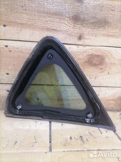 Стекло глухое заднее левое Opel Astra J