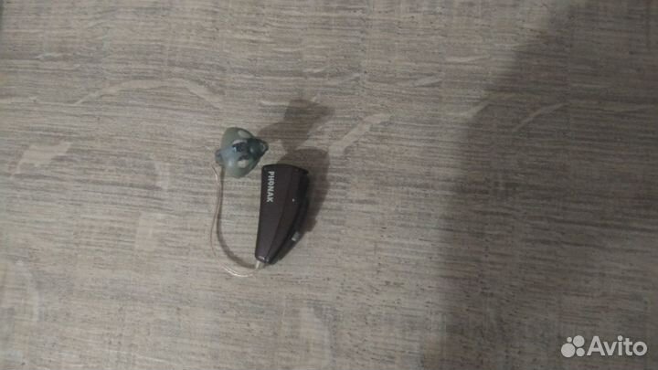 Заушный почти не видимый слуховой аппарат