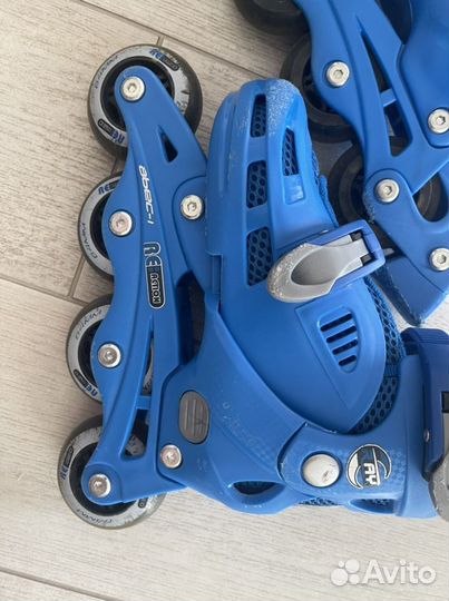 Роликовые коньки