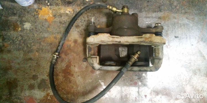 Суппорт nissan note, левый передний NE11