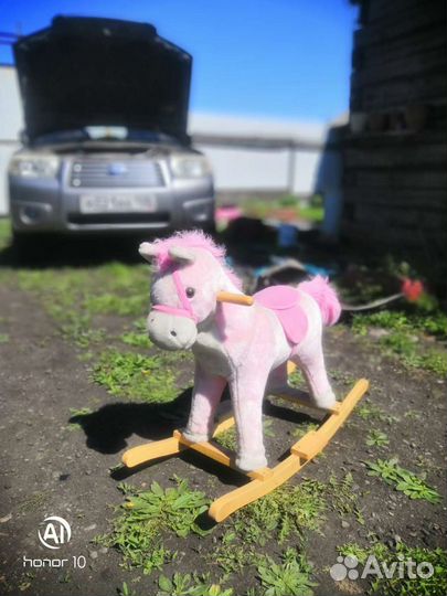 Лошадка качалка музыкальная