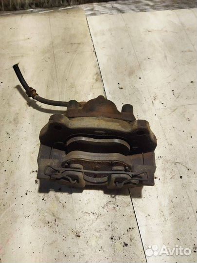 Суппорт тормозной передний левый Saab 9-3 2 YS3F