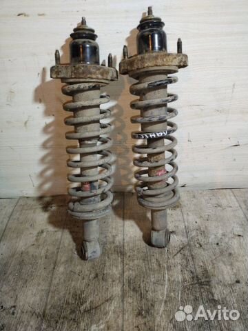 Стойка подвески задняя Mitsubishi Lancer 9