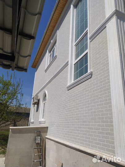 Облицовка фасада под кирпич