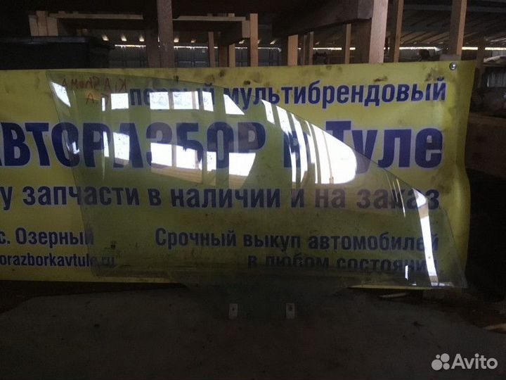 Стекло двери переднее левое Kia Shuma