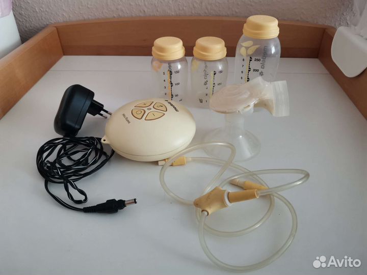 Молокоотсос medela электрический