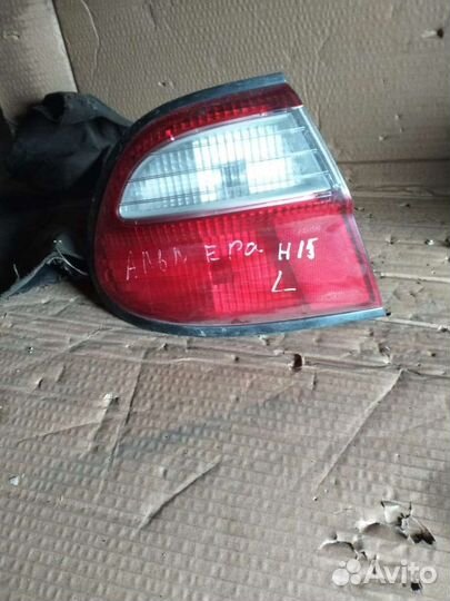 Фонарь левый Nissan Almera H15