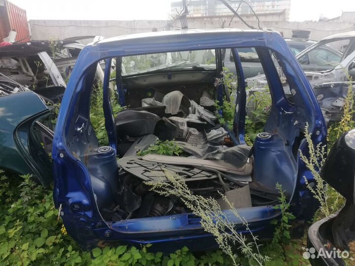 Кузов Мазда демио