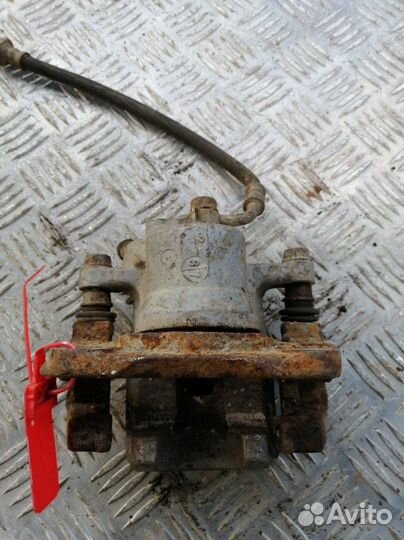 Суппорт задний правый Toyota Rav4 ACA30 2.0 1AZ-FE