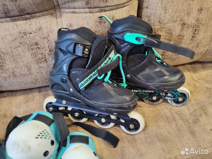 Роликовые коньки