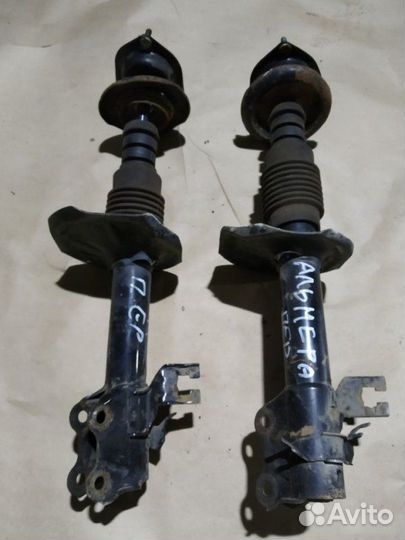 Амортизатор передний Nissan Almera N16