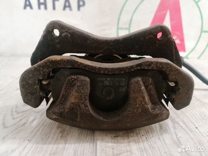 Суппорт передний левый Mitsubishi Lancer 10 CX3A