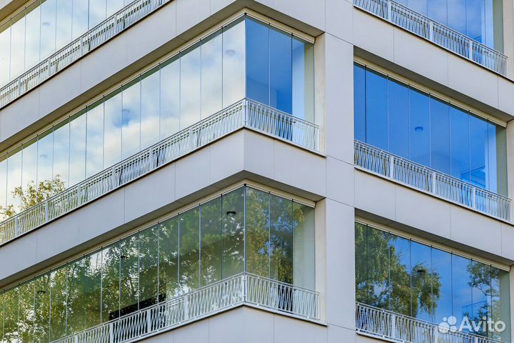 Безрамное остекление зданий