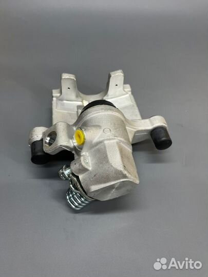 Суппорт тормозной задний левый Ford Focus 2