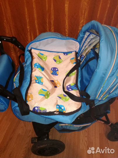 Коляска трансформер с поворотными колесами