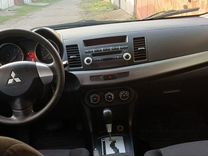 Mitsubishi Lancer 1.5 AT, 2011, 202 391 км, с пробегом, цена 1 080 000 руб.