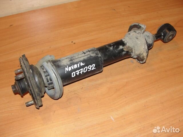 Передний амортизатор Nissan navara d40 2007г