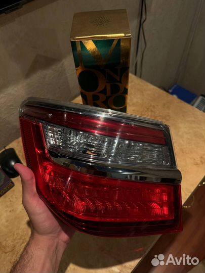 Фонарь левый наружный Toyota Camry V55