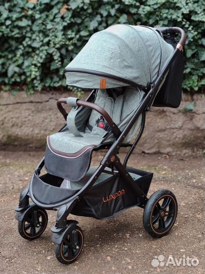 Прогулочная коляска Luxmom 609 зелёная