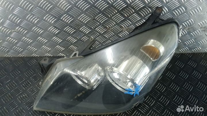 Фара левая Opel Astra H/Astra Family H