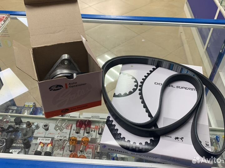 Комплект натяжитель ролик и ремень шевролет лачети