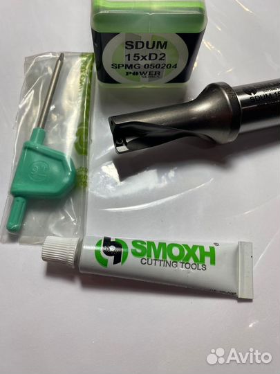 Сверло со сменными пластинами