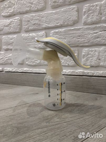 Молокоотсос medela ручной со смартсоской calma