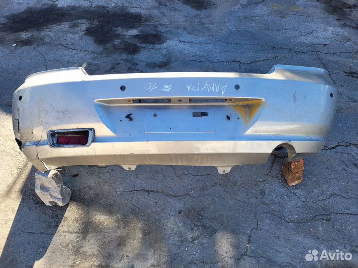 Бампер задний на Nissan Almera B10