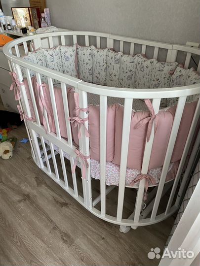 Детская кроватка с маятником круглая