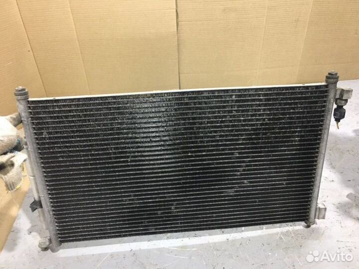 Радиатор кондиционера Nissan Note E11 HR16DE