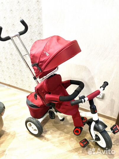 Трехколесный велосипед с ручкой