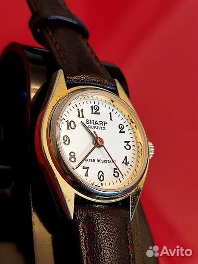 Часы sharp
