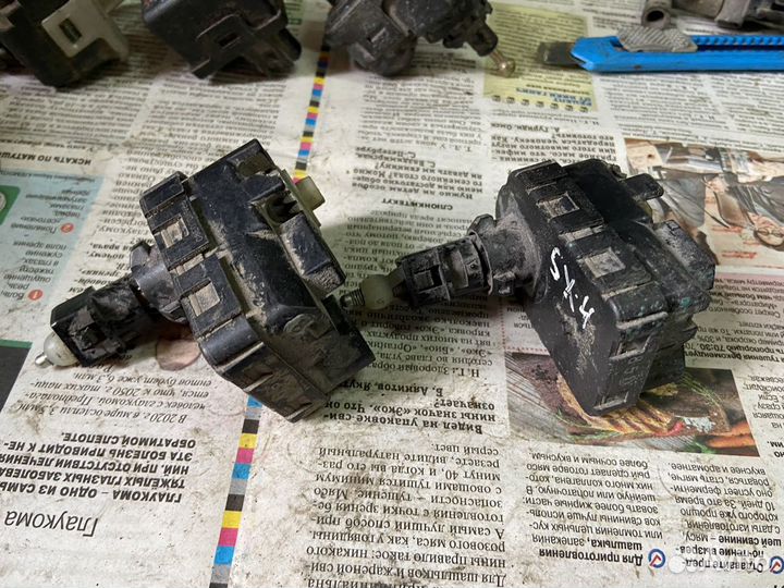 Моторчик корректор фар Suzuki SX 4 лев/пр