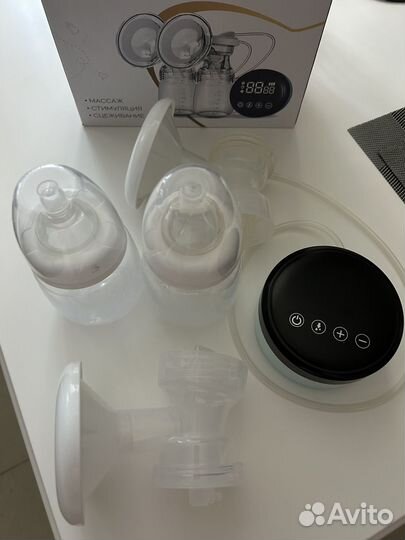 Молокоотсос ручной двойной Evo mama